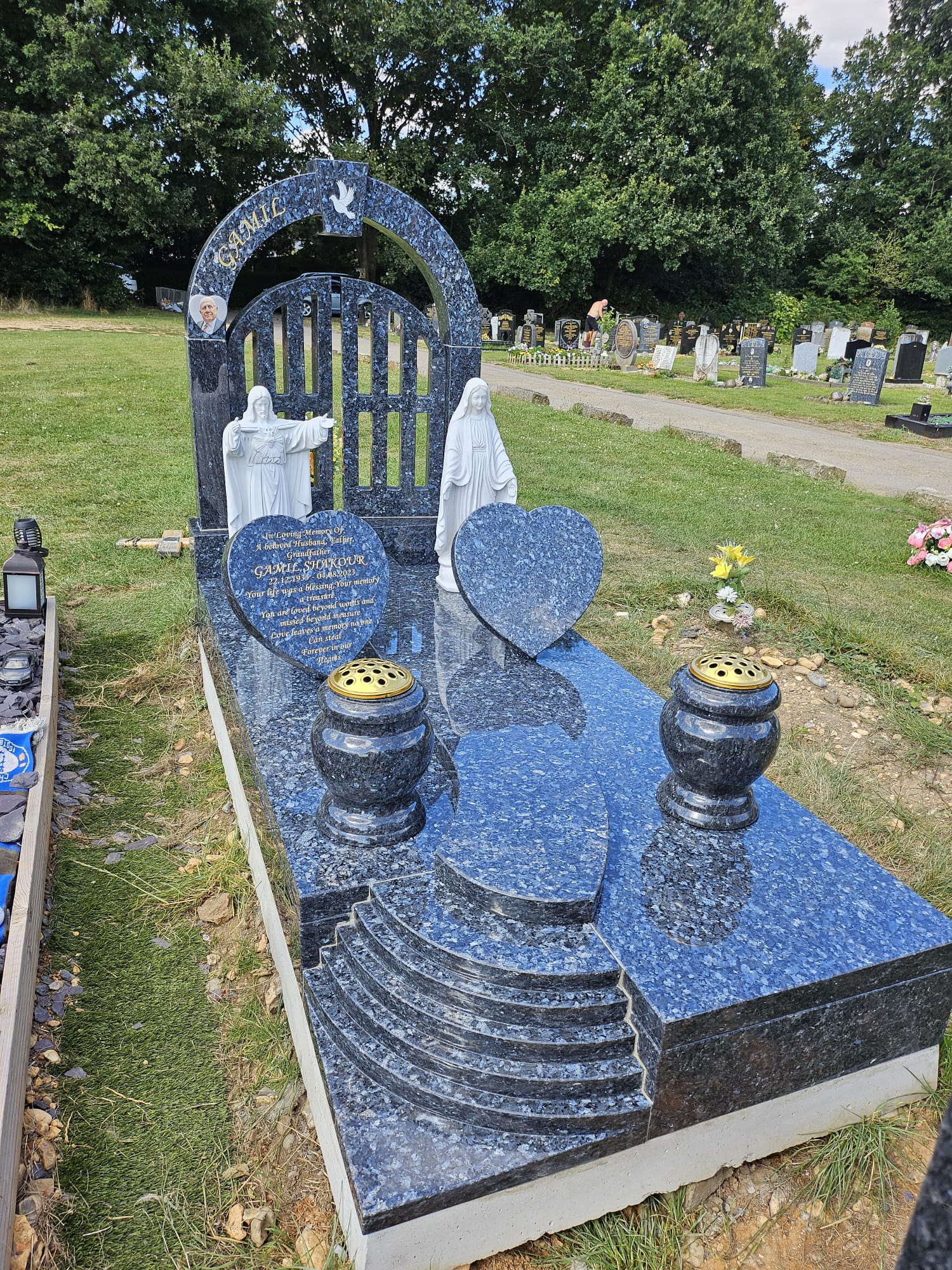Granite kerb memorial installation at North Watford Cemetery, Watford - Professional memorial masonry services